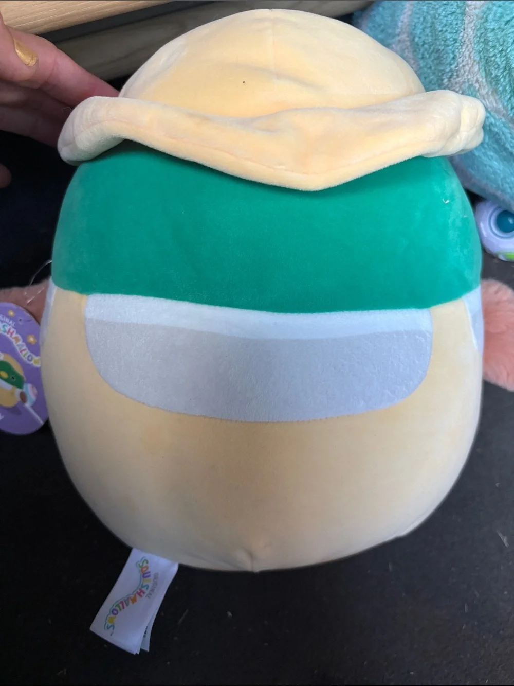 This is the Squishmallows Avery the Mallard Duck in Yellow Overalls plush